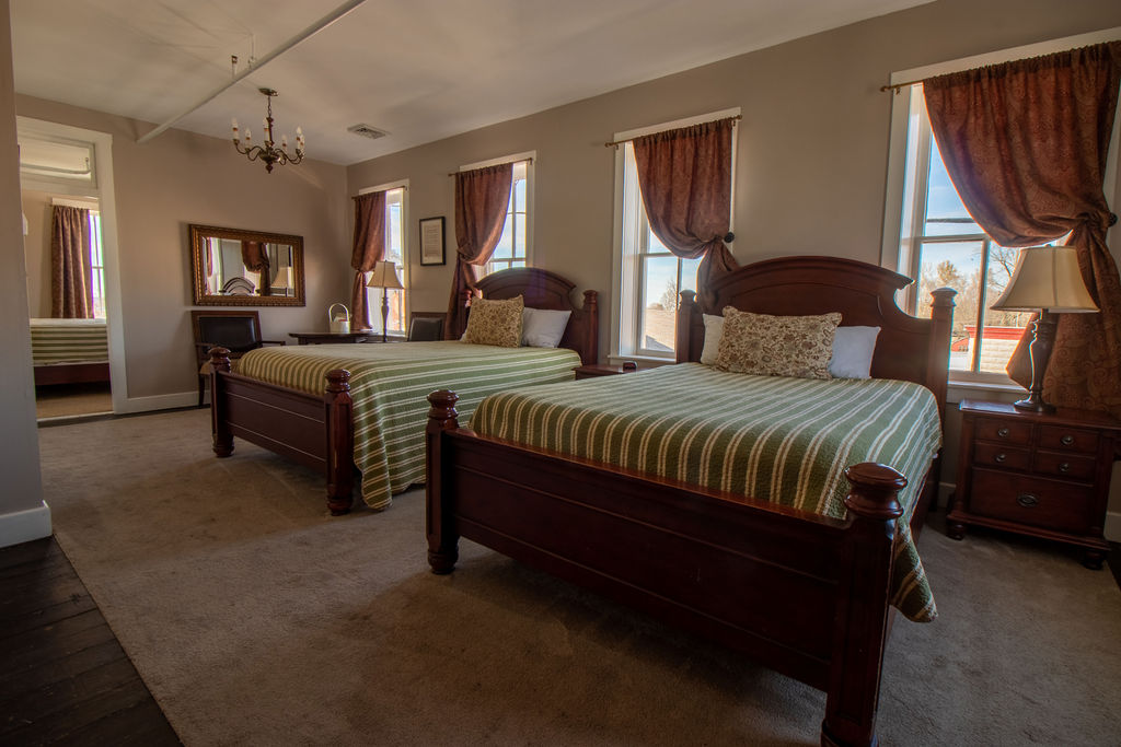 Two-Bedroom-Signature-Suite-304-Mainroom-Hotel two bedroom suite in Nauvoo Hotel